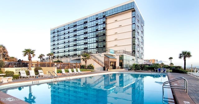 view of swimming pool featuring a patio