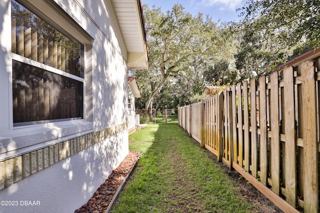 view of yard with a fenced backyard