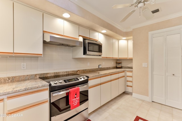 kitchen featuring under cabinet range hood, visible vents, stainless steel appliances, and ornamental molding