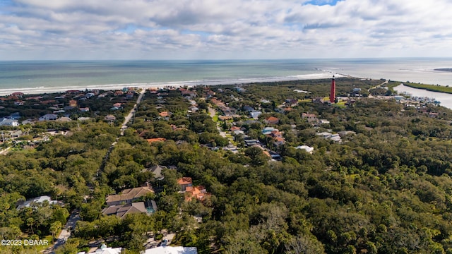 bird's eye view with a water view and a view of the beach