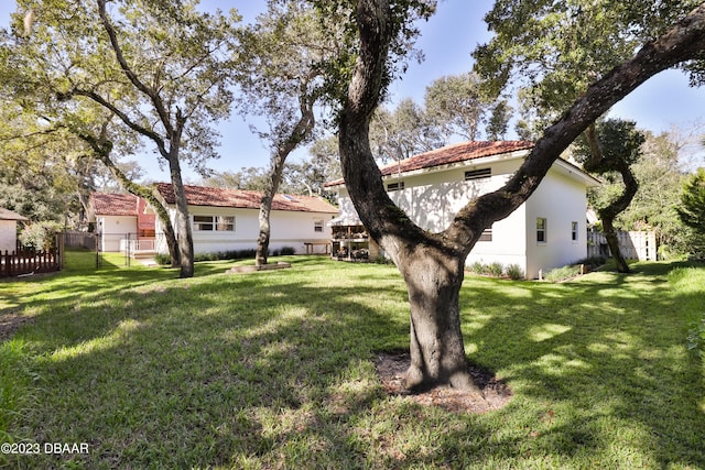 view of yard with fence