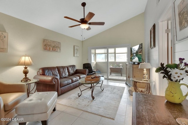 living room featuring ceiling fan, light tile patterned floors, and high vaulted ceiling