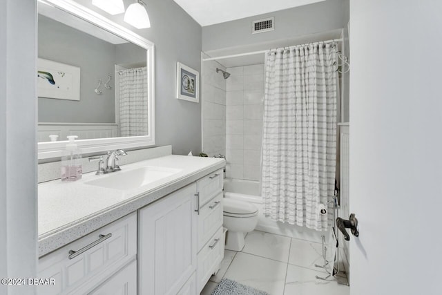 full bathroom with toilet, vanity, and shower / tub combo with curtain