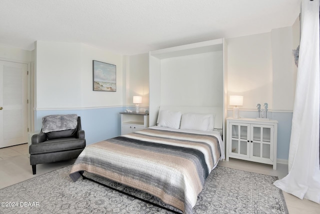 bedroom with a textured ceiling