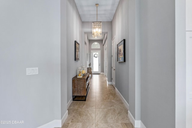 interior space featuring an inviting chandelier