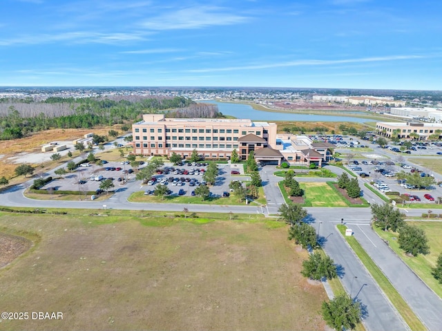 1372 Lombardi Ct, Poinciana, FL 34759 - drone / aerial view with a water view