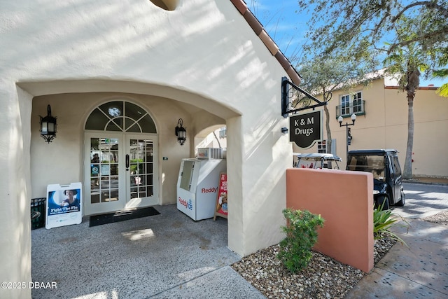 1372 Lombardi Ct, Poinciana, FL 34759 - view of exterior entry with french doors