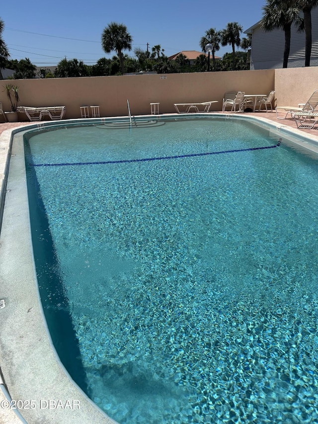 30 Inlet Harbor Rd Unit 5030, Ponce Inlet, FL 32127 - community pool featuring fence