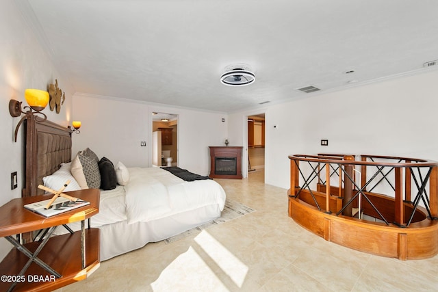 bedroom with crown molding