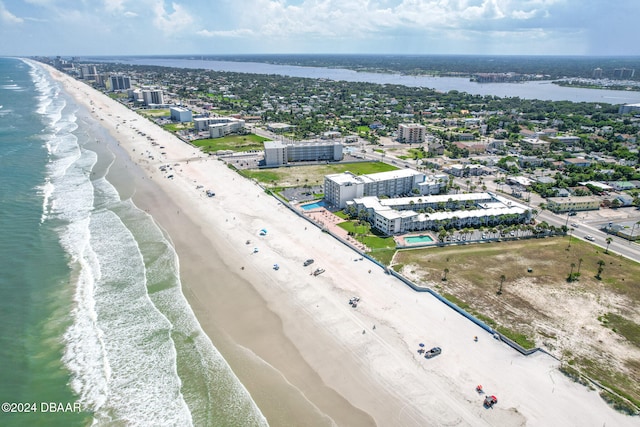 drone / aerial view with a view of the beach and a water view