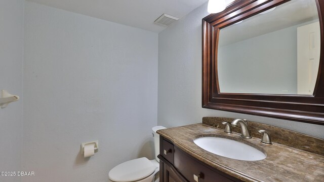 8 Fox Run Trl, Ormond Beach, FL 32174 - bathroom featuring vanity and toilet