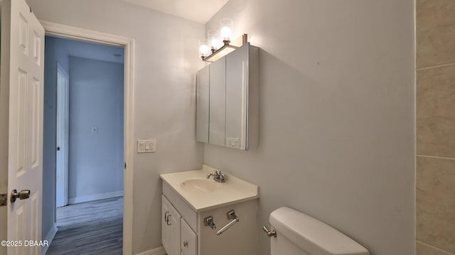 8 Fox Run Trl, Ormond Beach, FL 32174 - half bath with vanity and wood finished floors