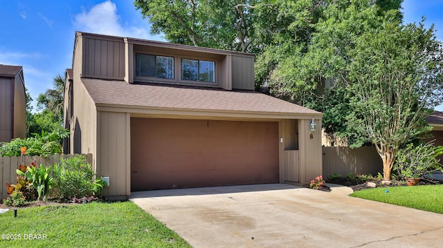 8 Fox Run Trl, Ormond Beach, FL 32174 - view of front of home featuring concrete driveway and an attached garage