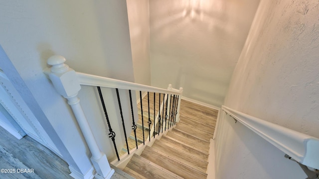 8 Fox Run Trl, Ormond Beach, FL 32174 - staircase featuring wood finished floors