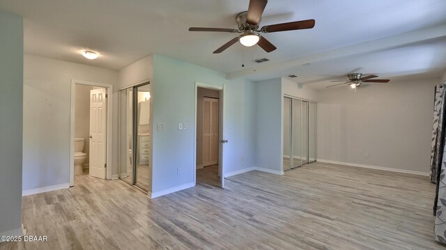 8 Fox Run Trl, Ormond Beach, FL 32174 - unfurnished living room with ceiling fan and light wood-style flooring
