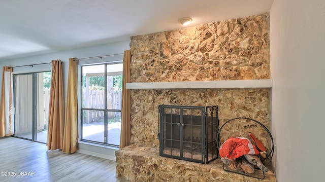 8 Fox Run Trl, Ormond Beach, FL 32174 - detailed view of wood finished floors and a stone fireplace