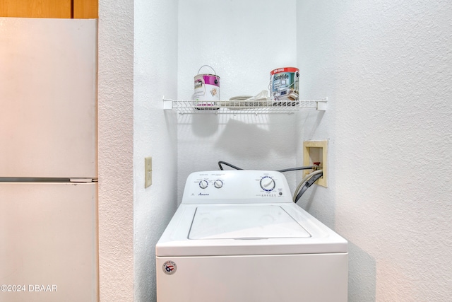 washroom featuring washer / clothes dryer