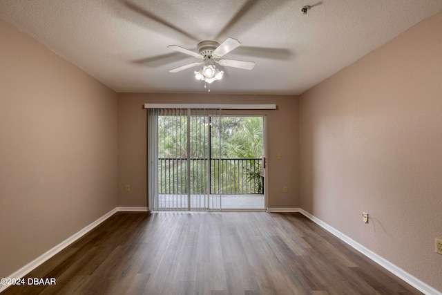 unfurnished room with ceiling fan, a textured ceiling, and dark hardwood / wood-style floors