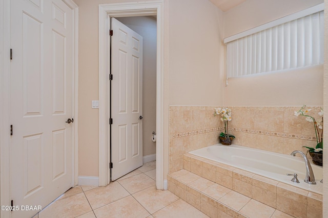 4427 S Atlantic Ave, Ponce Inlet, FL 32127 - full bathroom featuring tile patterned floors, a bath, and baseboards