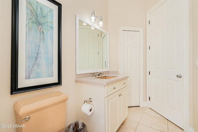 4427 S Atlantic Ave, Ponce Inlet, FL 32127 - bathroom featuring tile patterned floors, vanity, and toilet