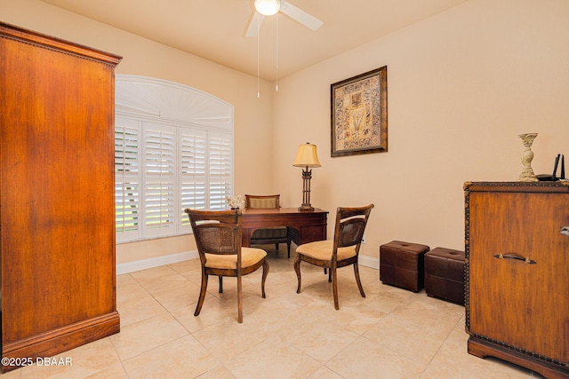 4427 S Atlantic Ave, Ponce Inlet, FL 32127 - home office with a ceiling fan, light tile patterned floors, and baseboards