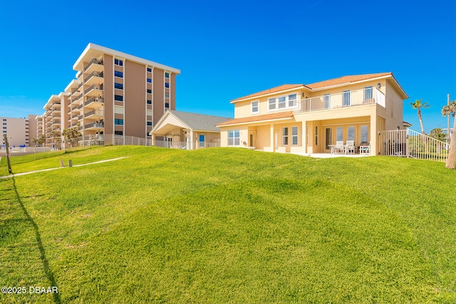4427 S Atlantic Ave, Ponce Inlet, FL 32127 - rear view of property featuring a balcony and a patio area