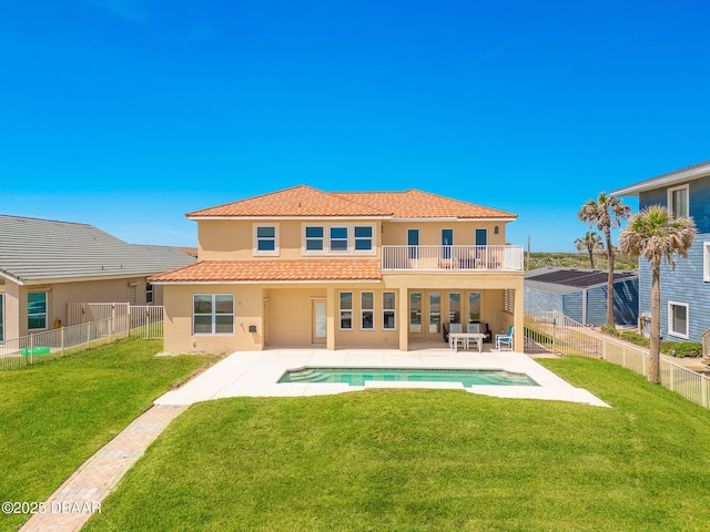 4427 S Atlantic Ave, Ponce Inlet, FL 32127 - rear view of property featuring stucco siding, a patio area, a balcony, and a tiled roof