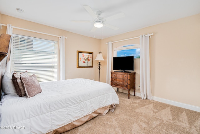 4427 S Atlantic Ave, Ponce Inlet, FL 32127 - bedroom with carpet, baseboards, and ceiling fan