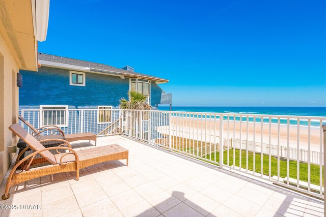 4427 S Atlantic Ave, Ponce Inlet, FL 32127 - view of patio / terrace featuring a balcony and view of water and beach
