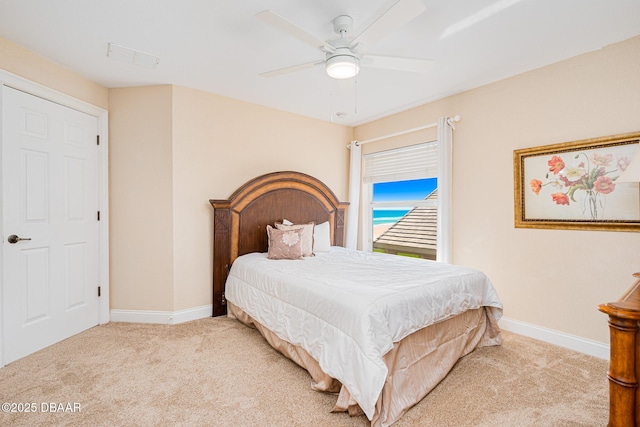 4427 S Atlantic Ave, Ponce Inlet, FL 32127 - bedroom with carpet flooring, baseboards, and ceiling fan