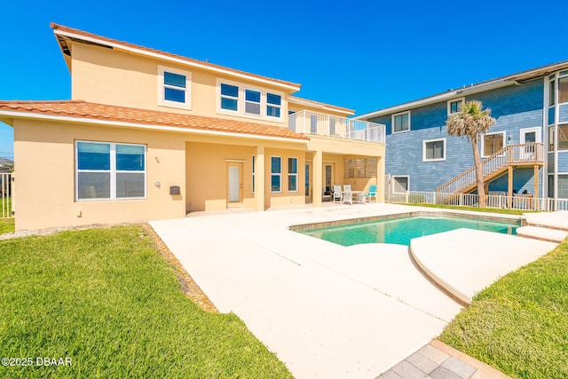 4427 S Atlantic Ave, Ponce Inlet, FL 32127 - view of swimming pool featuring a patio area and a lawn
