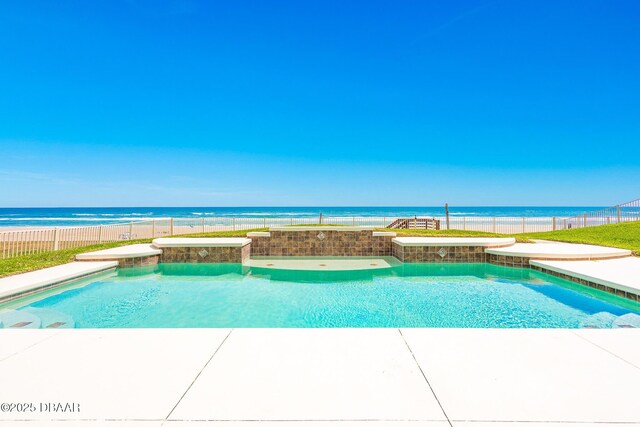 4427 S Atlantic Ave, Ponce Inlet, FL 32127 - view of swimming pool featuring fence and a water view