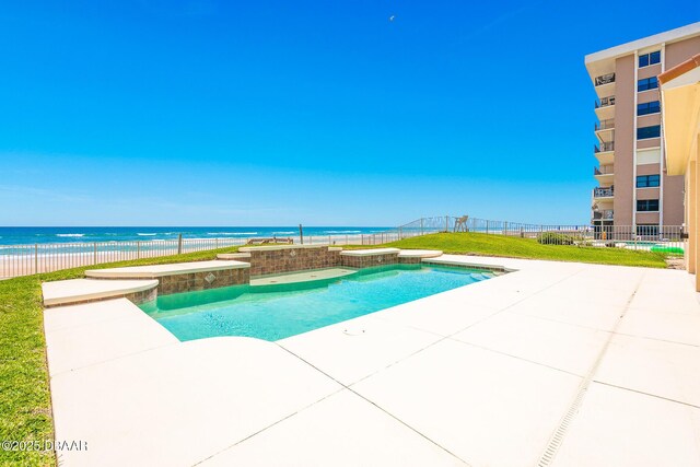 4427 S Atlantic Ave, Ponce Inlet, FL 32127 - view of pool with fence, a patio, and a water view
