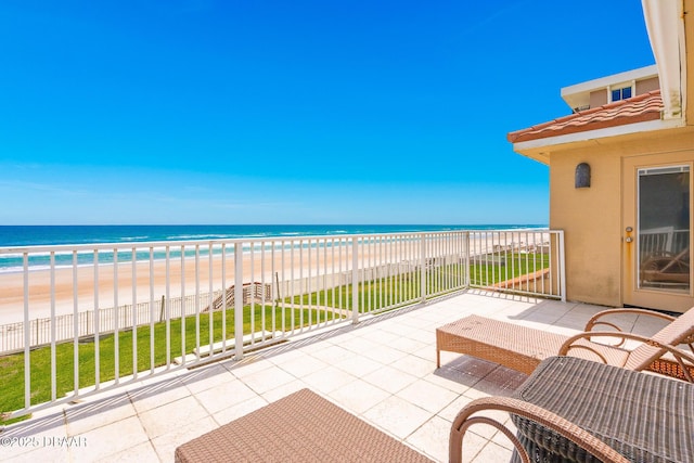 4427 S Atlantic Ave, Ponce Inlet, FL 32127 - view of patio featuring a balcony and view of water and beach