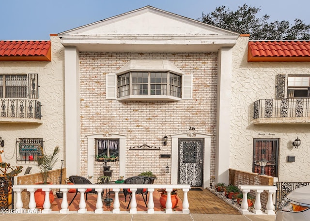 view of front of property with a patio