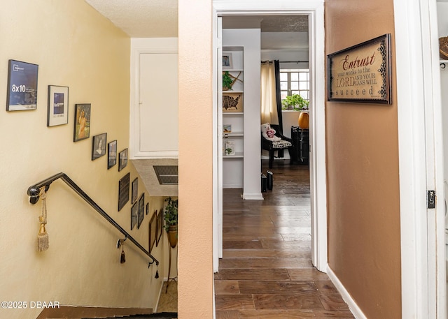 corridor featuring dark wood-type flooring