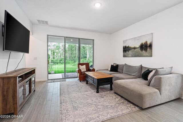 living room featuring light wood-type flooring