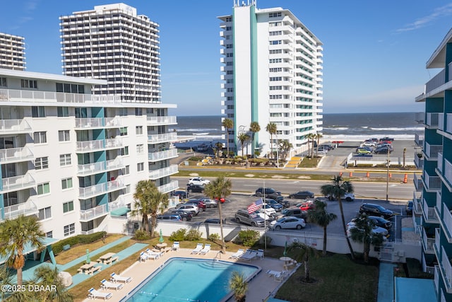 exterior space with a view of city and uncovered parking