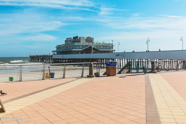 view of patio featuring a water view