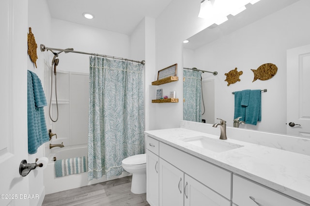 802 Margaritaville Ave, Daytona Beach, FL 32124 - full bath featuring toilet, wood finished floors, shower / tub combo, vanity, and recessed lighting