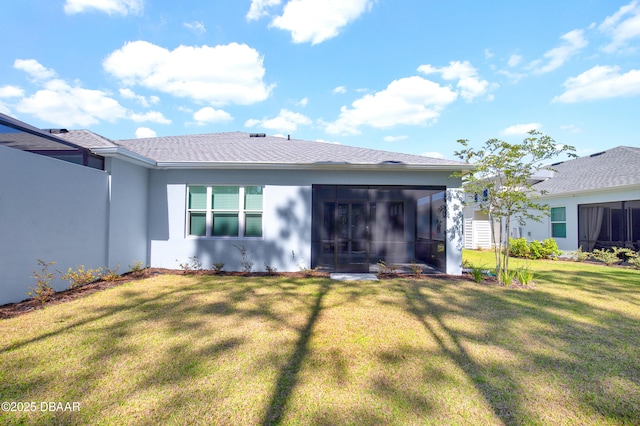 802 Margaritaville Ave, Daytona Beach, FL 32124 - rear view of house featuring a sunroom, stucco siding, and a yard