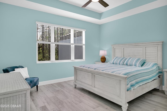802 Margaritaville Ave, Daytona Beach, FL 32124 - bedroom featuring light wood finished floors, baseboards, and a ceiling fan