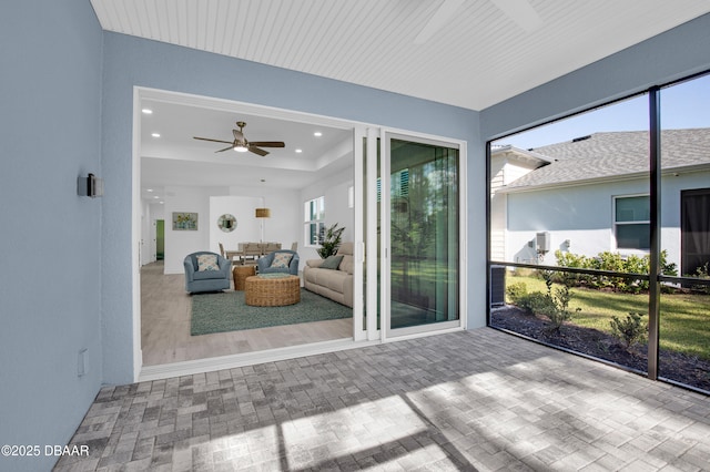 802 Margaritaville Ave, Daytona Beach, FL 32124 - sunroom / solarium featuring ceiling fan and an outdoor living space