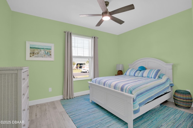 802 Margaritaville Ave, Daytona Beach, FL 32124 - bedroom featuring light wood-style floors, baseboards, and a ceiling fan