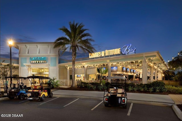802 Margaritaville Ave, Daytona Beach, FL 32124 - view of building exterior with uncovered parking