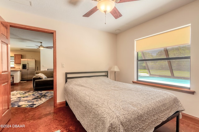 bedroom with stainless steel refrigerator with ice dispenser, ceiling fan, and dark carpet