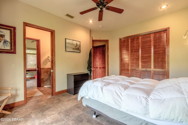 tiled bedroom with ceiling fan