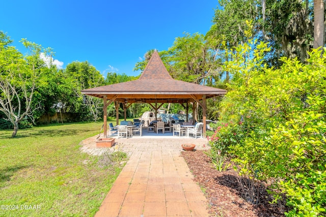 view of yard featuring a patio and a gazebo