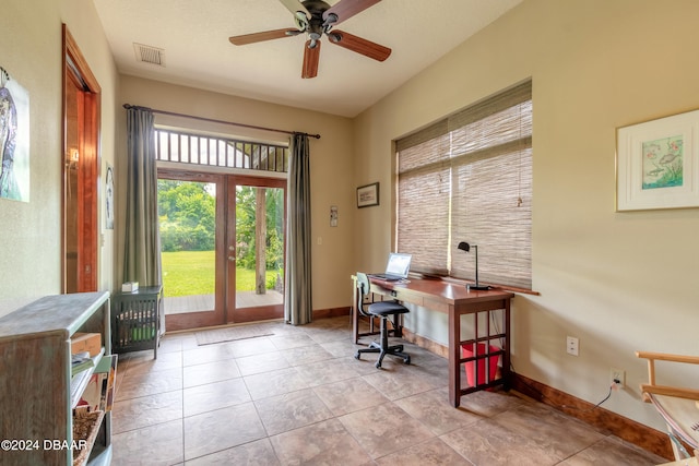 tiled home office with french doors and ceiling fan