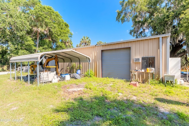 exterior space with a lawn and a carport